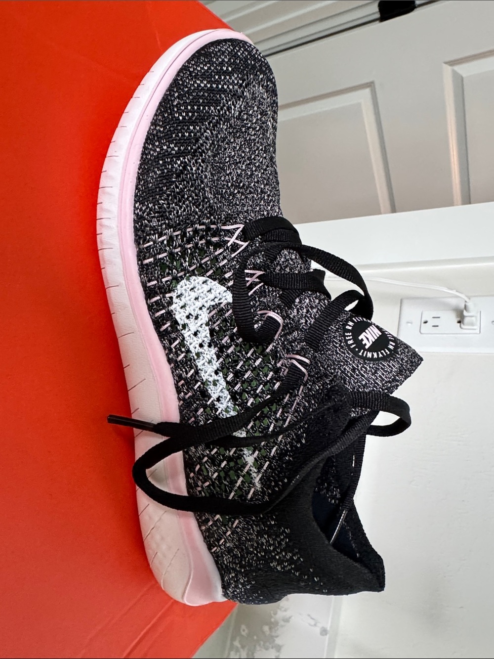 Nike Black Flyknit Trainer with Pink Trim NEW
